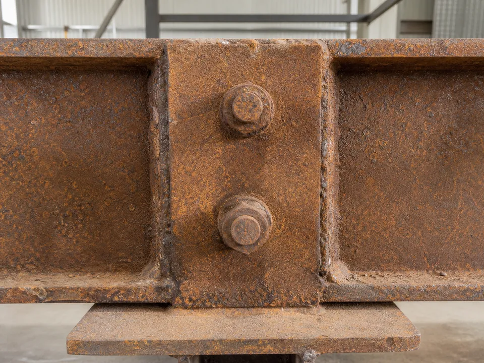 Steel beam before surface rust removal